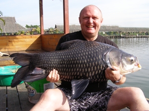 Baron and his 58lb Siamese Carp caught fishing in Bangkok