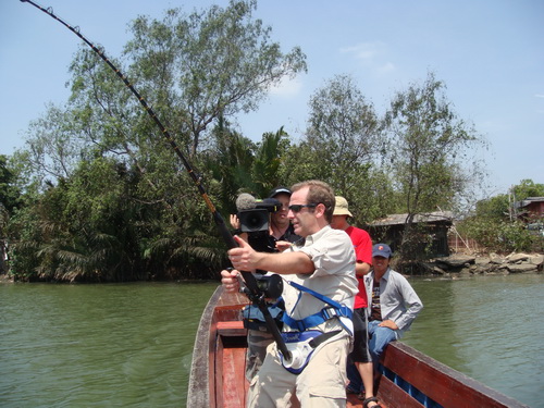 Robson Green filming extreme fishing Thailand playing a freshwater stingray